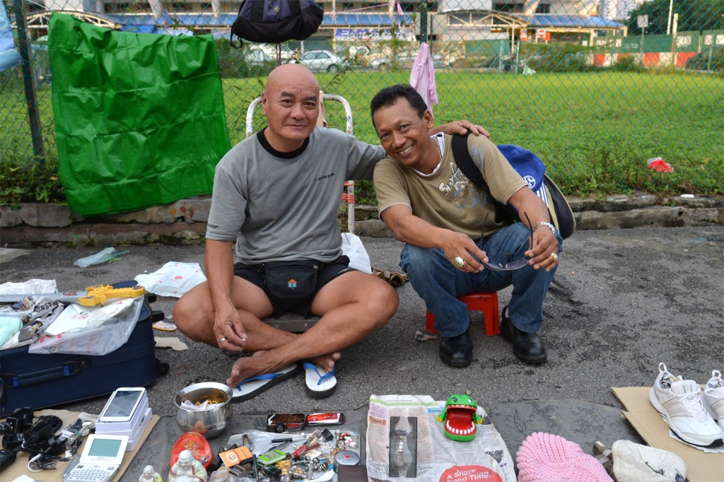 Mr. Ho on the left with a visitor to his stall